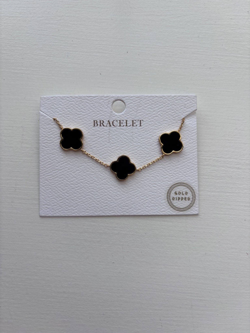 Gold-Dipped Black Clover Bracelet
